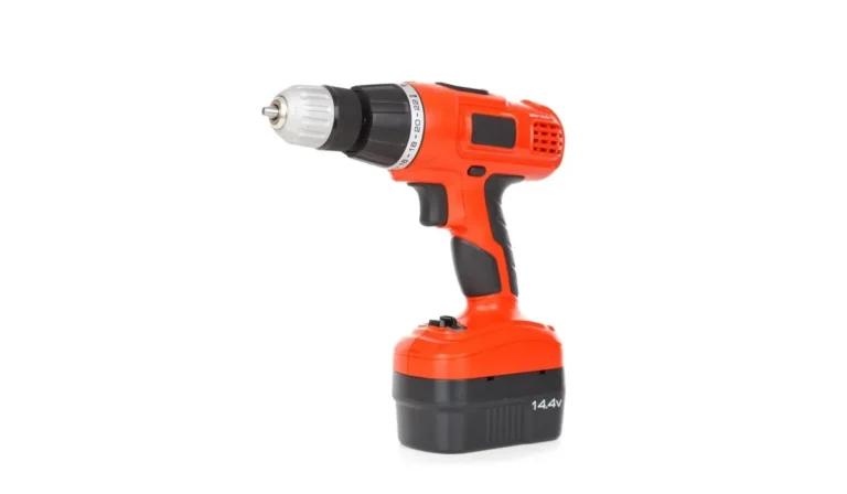 Cordless drill with a removable battery pack on a white background