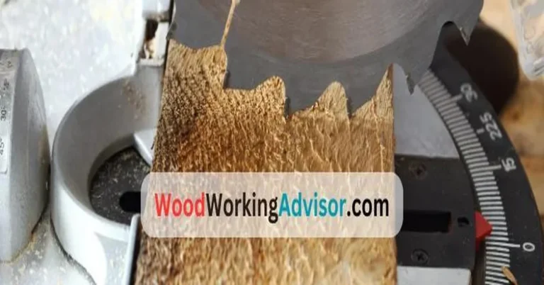 A miter saw blade cutting through a wood board