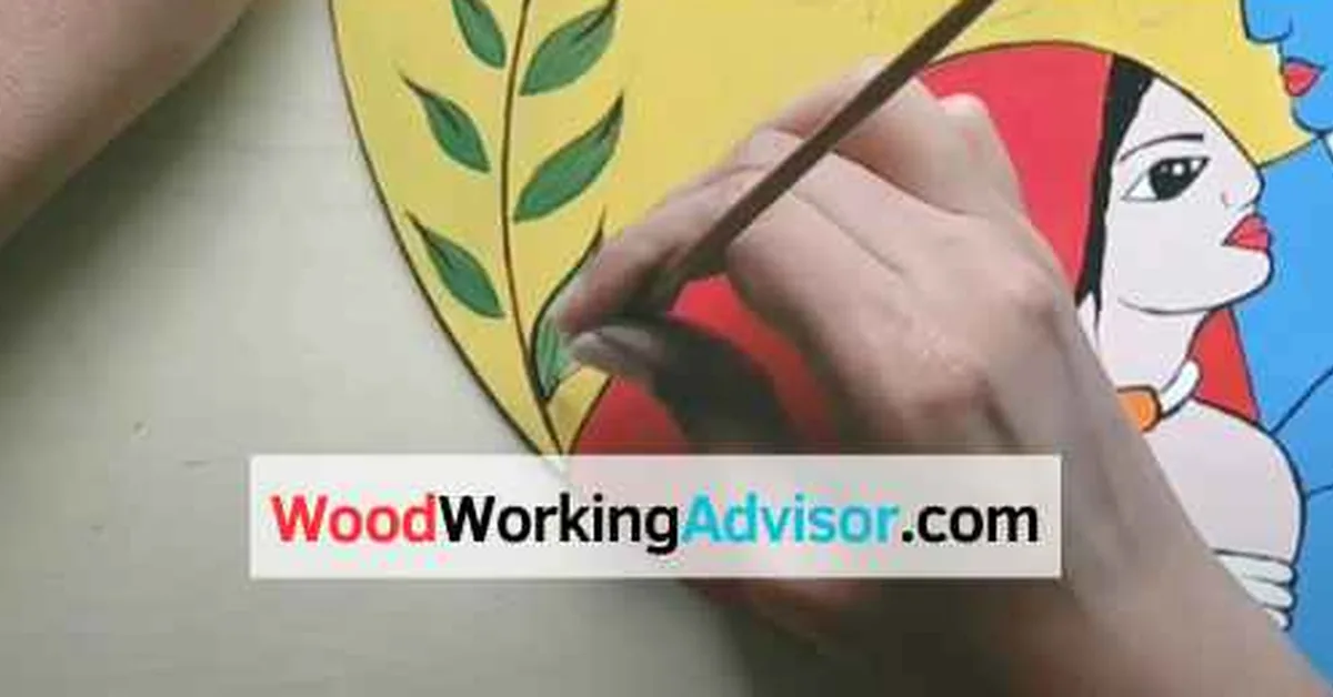 Hand painting a colorful mural design onto a round MDF board