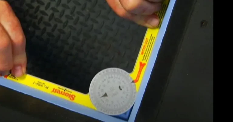 digital display of a miter saw protractor reading the miter cut scale at a wood corner joint