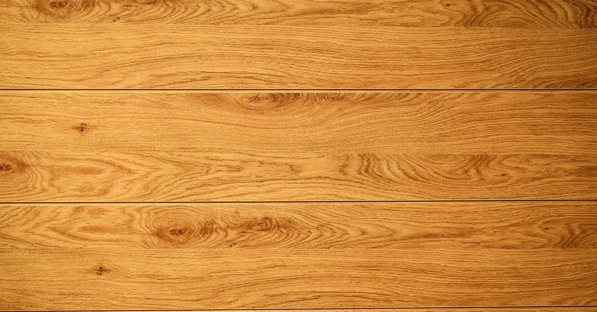 Finished oak planks with a warm honey-gold color and visible grain