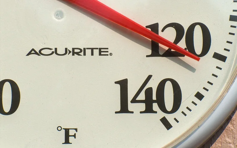 Outdoor thermometer showing hot summer temperature, relevant to ideal Kilz application weather Outdoor thermometer showing hot summer temperature, relevant to ideal Kilz application weather