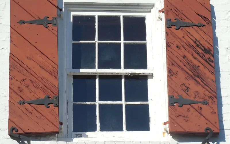 weathered wooden window frame with peeling paint before resealing weathered wooden window frame with peeling paint before resealing