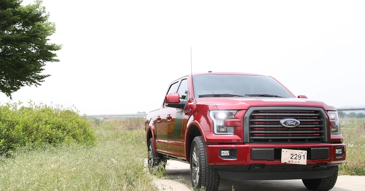 pickup truck used for hauling long lumber boards