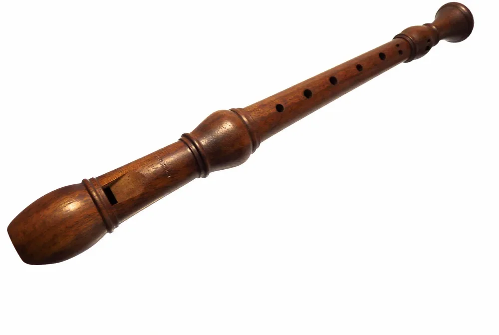 Wooden recorder with the block, window and turned joint rings visible