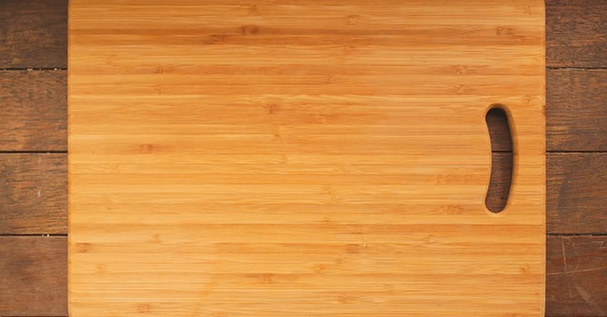 Close-up of a light rubber wood countertop surface showing its straight, uniform grain