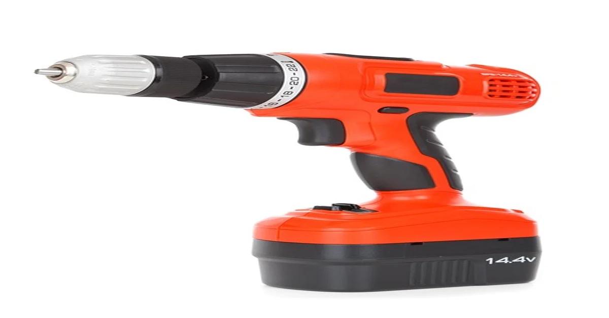 Cordless power tool battery being removed from a drill, representing Ryobi battery repair and replacement