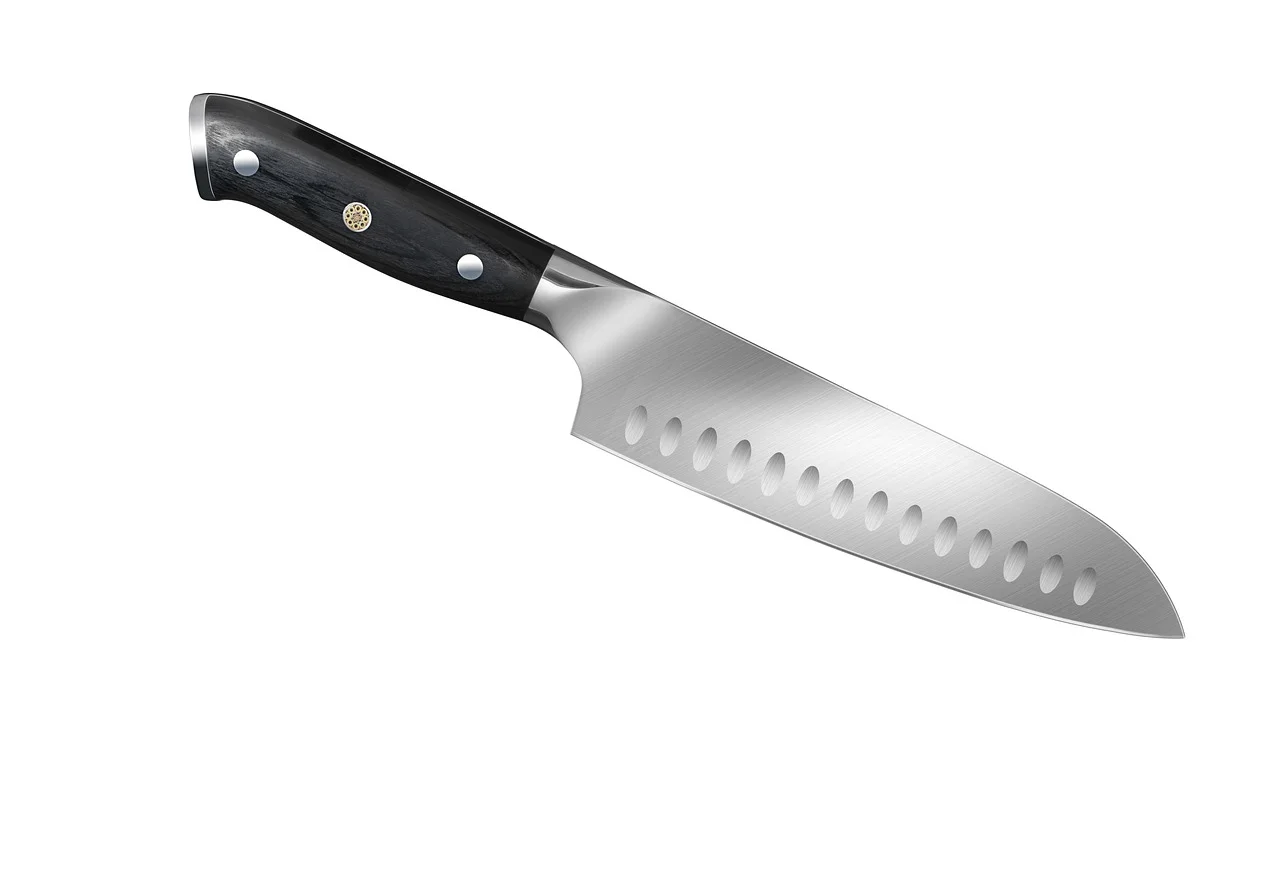 single-edge kitchen knife with a polished steel blade