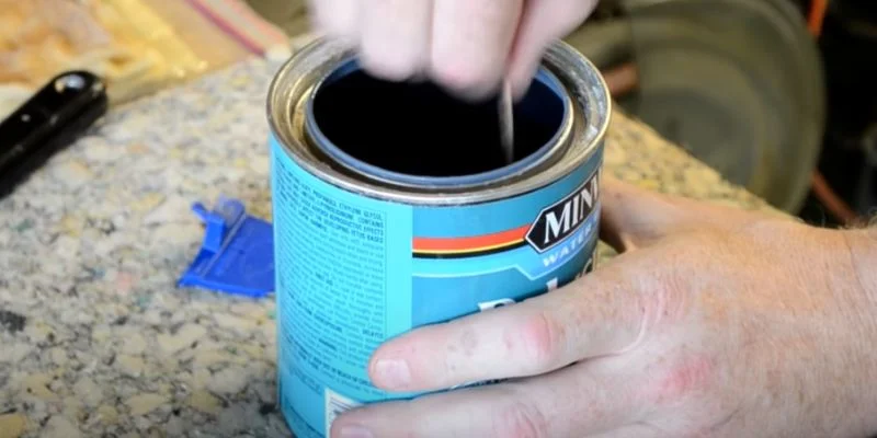 Can of Minwax Polycrylic water-based protective finish ready to spray