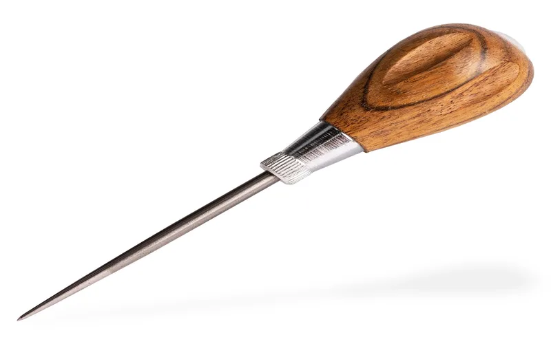 Close-up of a wood-handled scratch awl with a steel point