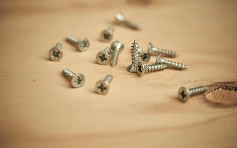 Self-tapping wood screws used for joining plywood panels in furniture assembly