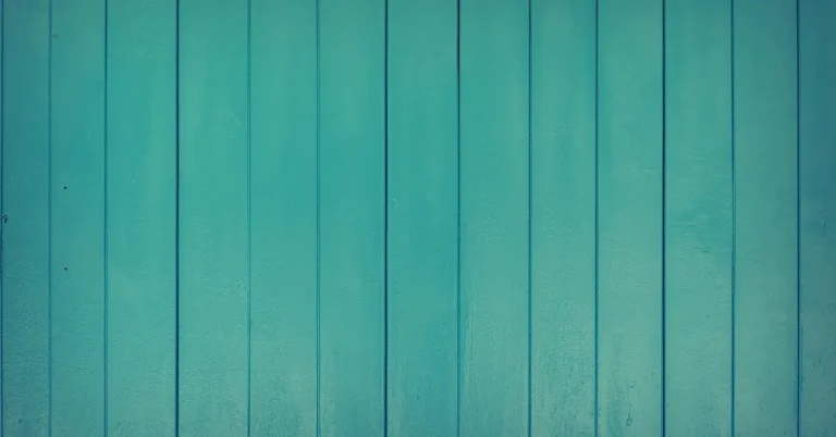 close-up of teal painted wood plank surface