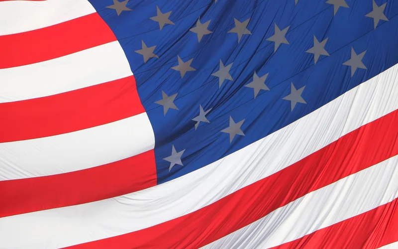 Close-up of American flag fabric stripes and stars before folding for framing