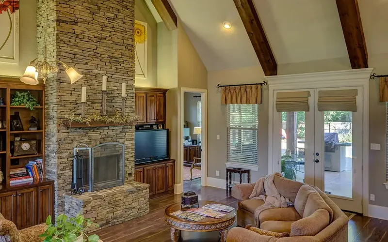 Deep reddish-brown hardwood floor at mature cherry color living room with a deep reddish-brown hardwood floor showing the mature color cherry wood develops over time