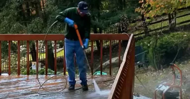 pressure washing a weathered wood deck before deciding whether to strip old stain
