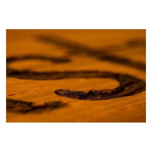 Wood surface with a rich stained and varnished finish, similar to what a properly thinned shellac coat produces