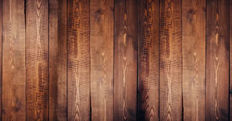 Rich dark stained oak hardwood floor planks showing deep brown wood grain