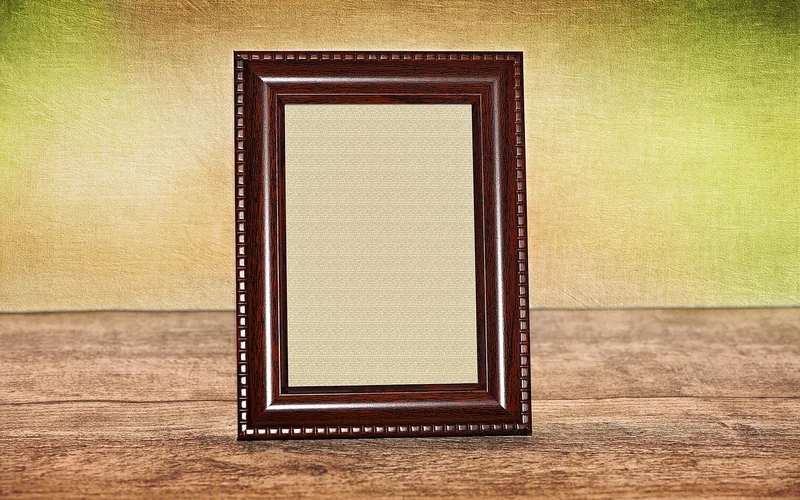 Decorative wooden picture frame, the type of solid frame recommended for displaying a folded flag