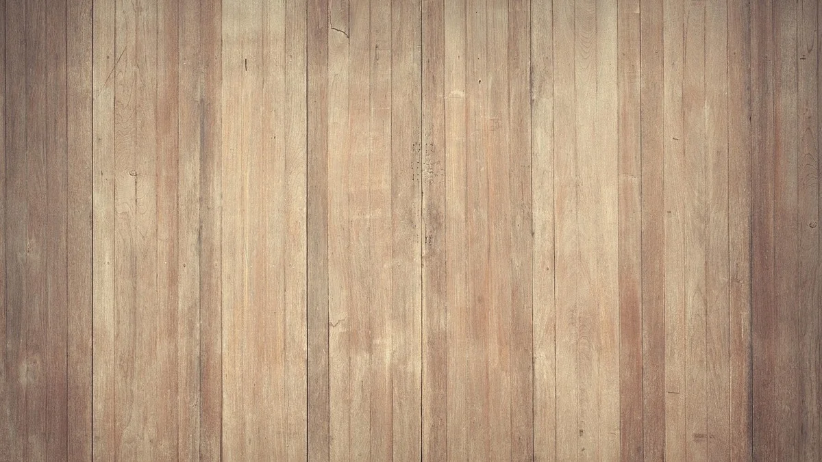 Wood plank floor surface before skim coat prep