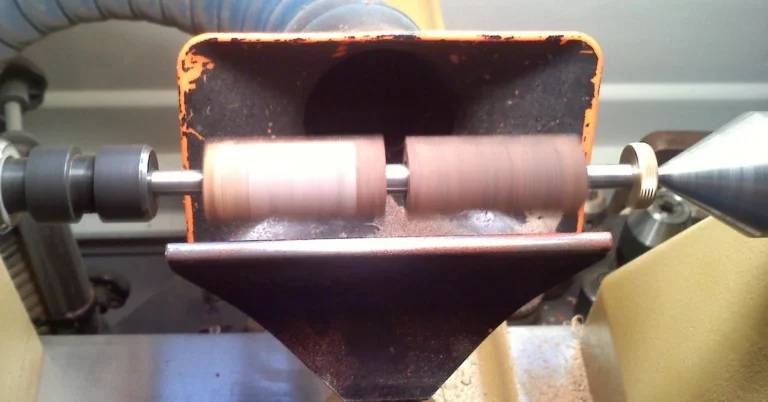 woodworker turning a wooden vase blank on a lathe in a home workshop