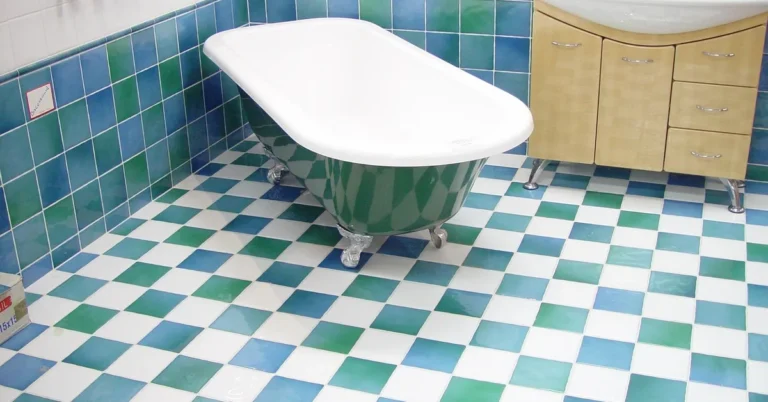 empty freestanding bathtub in a tiled bathroom ready for a wooden caddy tray