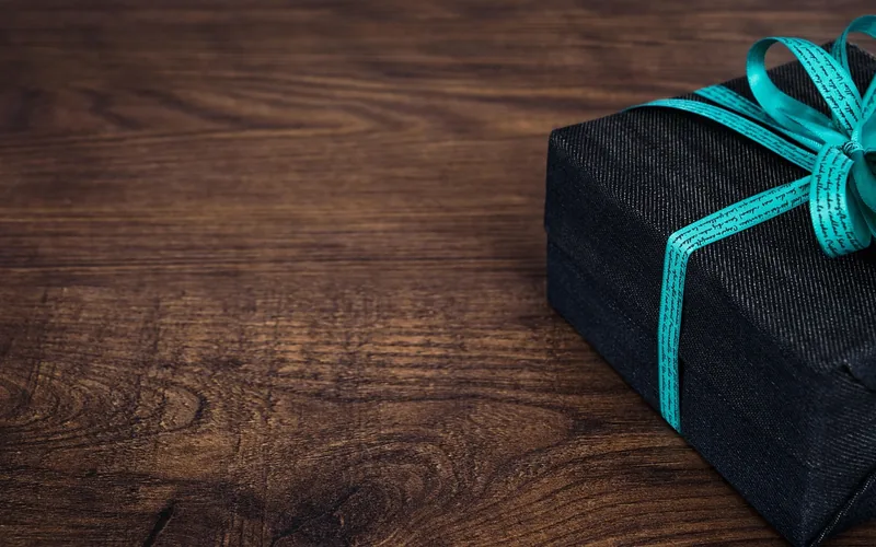 personalized wooden gift box tied with ribbon for a handmade occasion