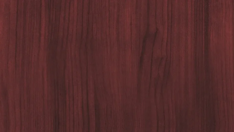 Reddish-brown mahogany-toned wood surface with straight grain lines