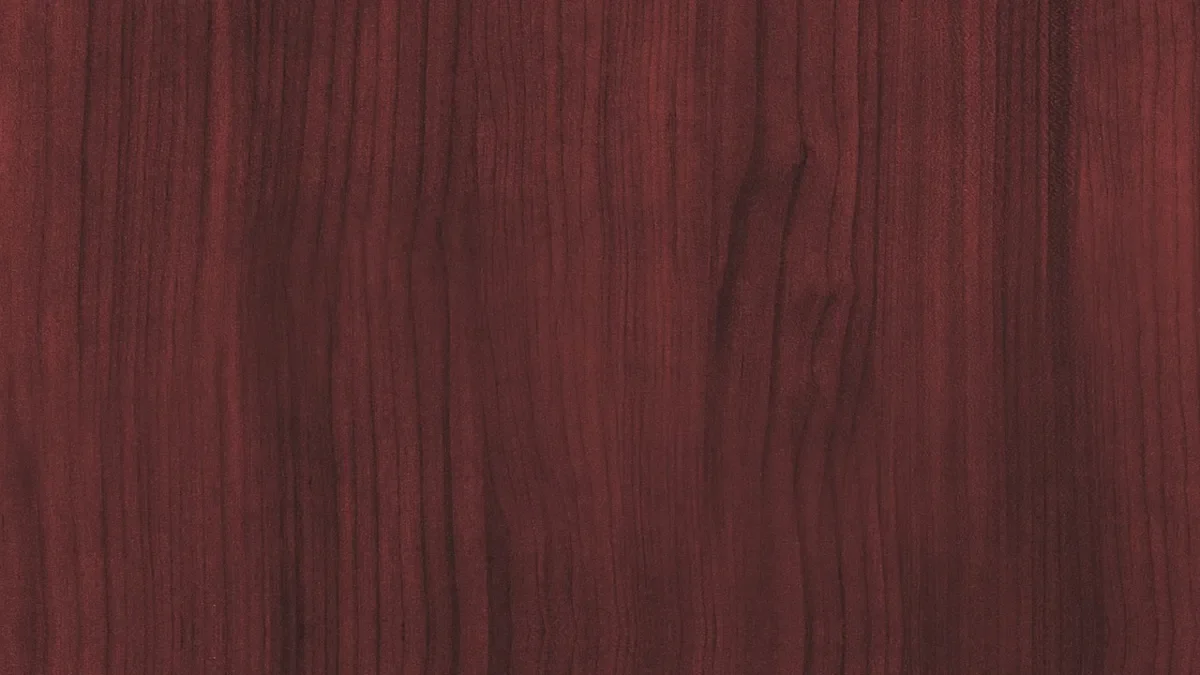 Reddish-brown mahogany-toned wood surface with straight grain lines