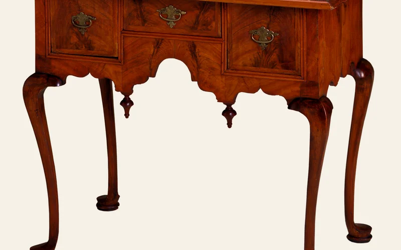 Antique walnut wood table showing rich reddish-brown grain