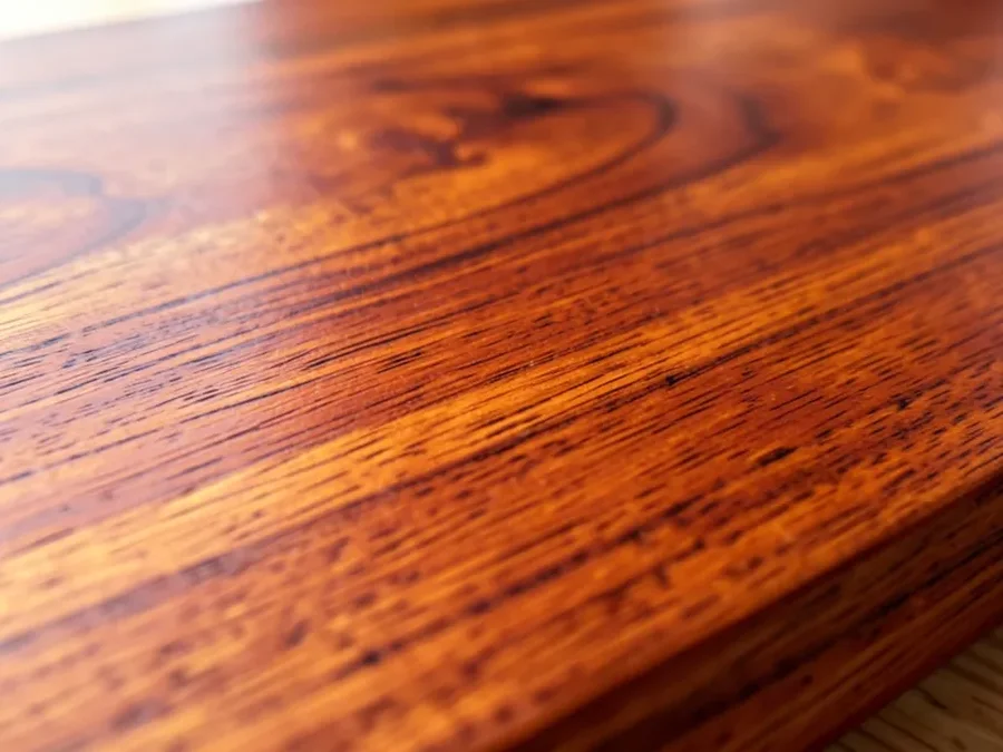Close-up of warm reddish brown cherry wood grain