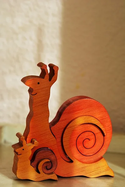 Hand-carved wooden toy animals kids can make from woodworking projects