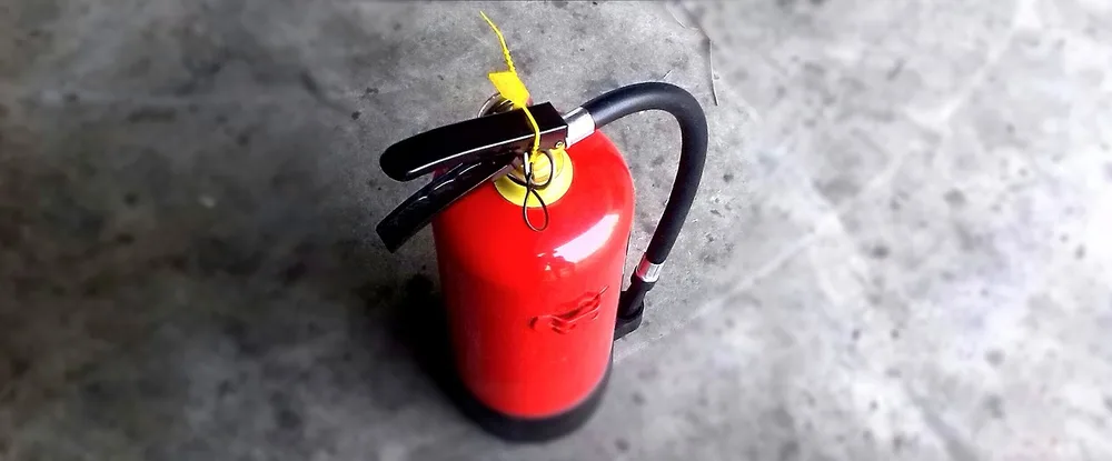 Fire extinguisher mounted as a garage safety precaution
