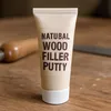 Stainable wood filler with dry-time color indicator