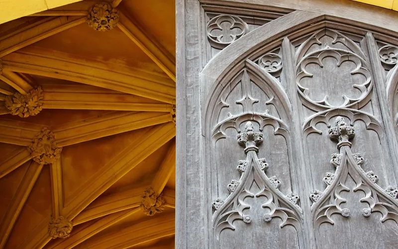 carved wooden entrance door showing detailed relief carving craftsmanship