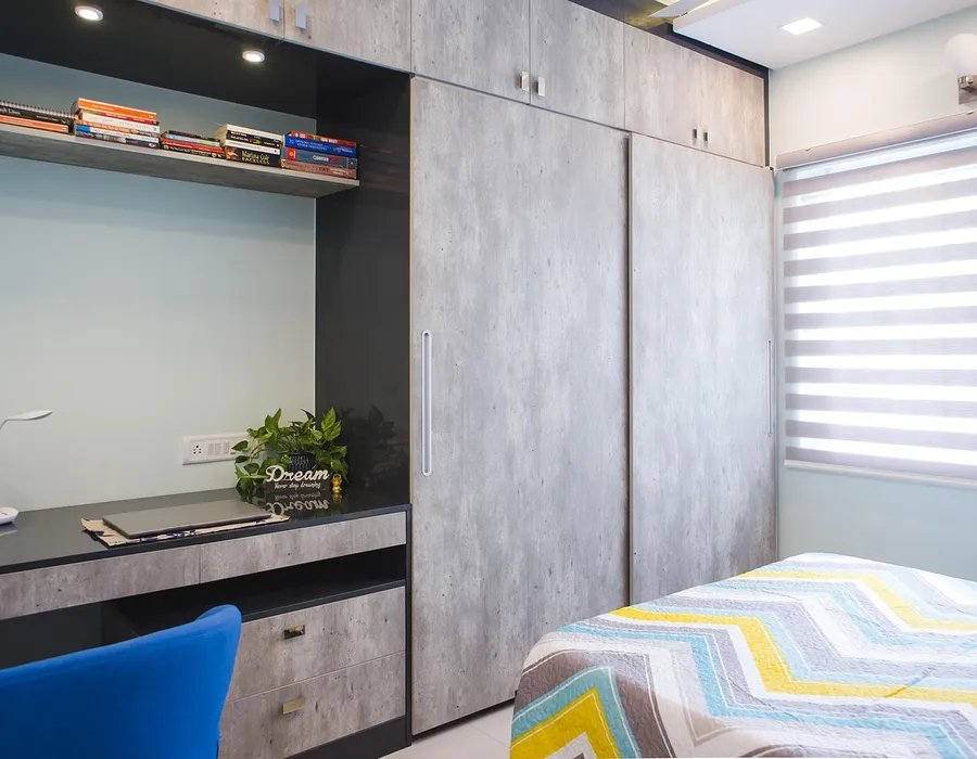 Teak wood wardrobe with a textured rustic-finish sliding door
