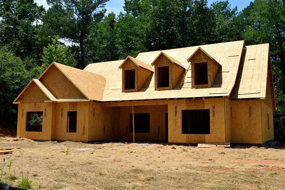 Wood-framed house with OSB sheathing under construction