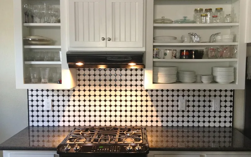 Painted MDF kitchen cabinets in long-term use White painted kitchen cabinets made from MDF, a common long-term application when kept away from direct moisture