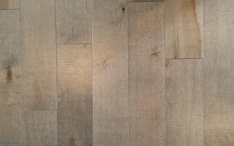 Maple flooring boards showing light grain and small knots Maple flooring boards showing light grain and small knots