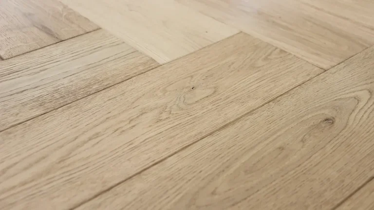Light oak herringbone hardwood floor planks