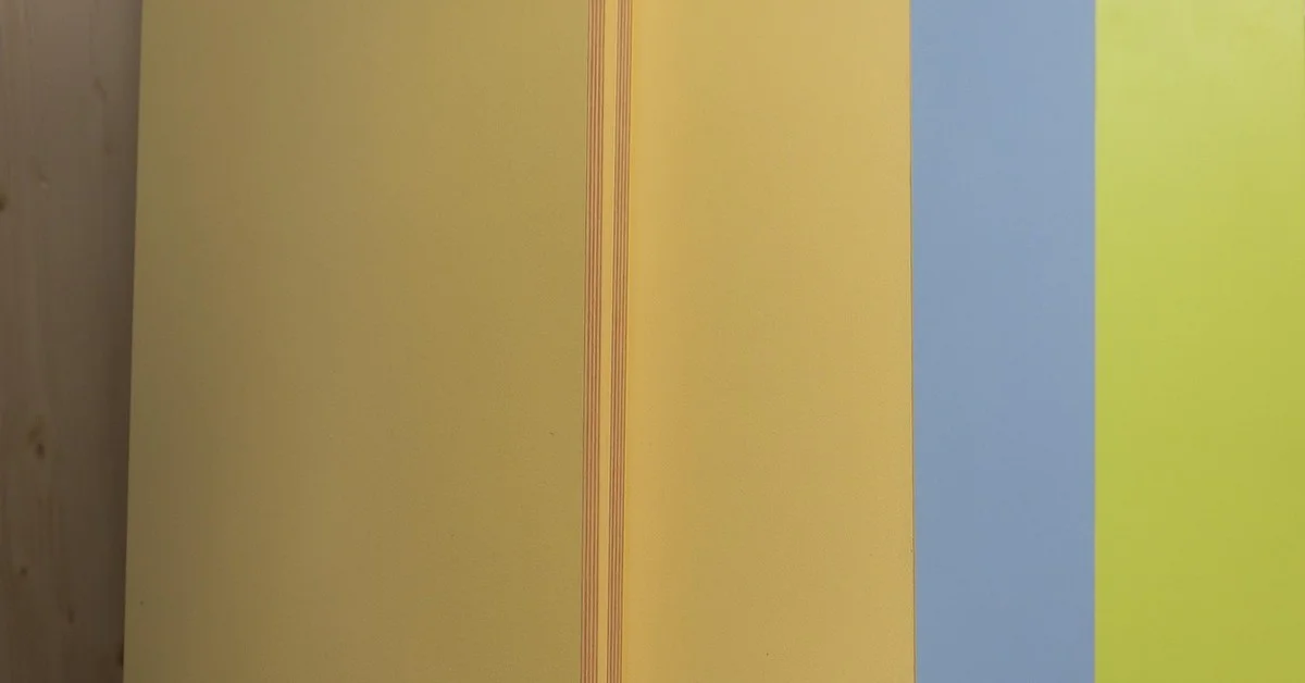 MDF board edge showing the layered core where formaldehyde fumes originate