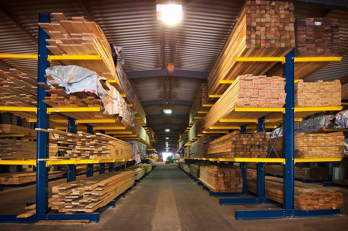 Rows of MDF and lumber board stock at a building supply yard