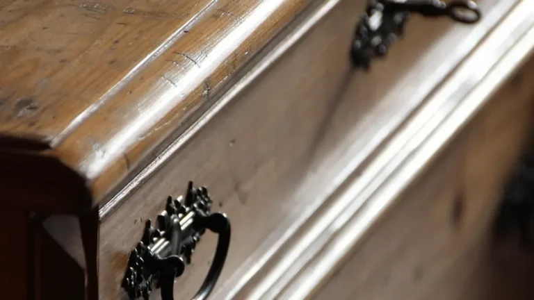 Wooden dresser drawer with a metal pull, the type of drawer built in this MDF drawer guide