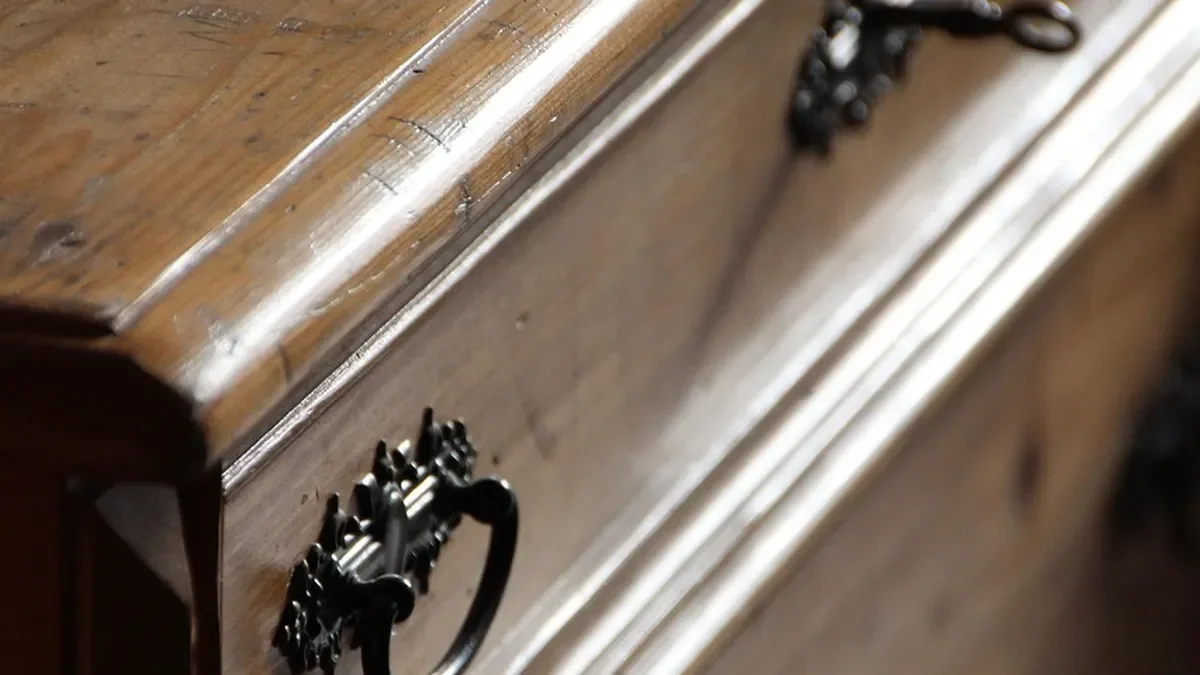 Wooden dresser drawer with a metal pull, the type of drawer built in this MDF drawer guide
