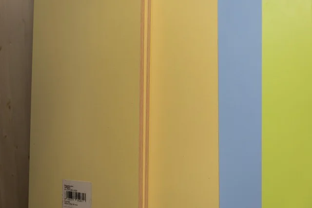 MDF sheets on a hardware store rack