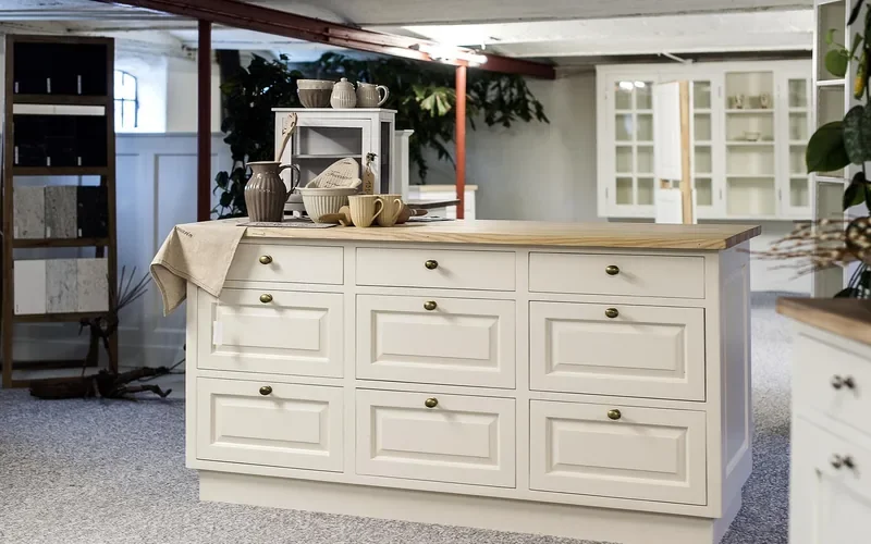 Painted raised-panel cabinet drawer fronts on a kitchen island Painted raised-panel cabinet drawer fronts on a kitchen island