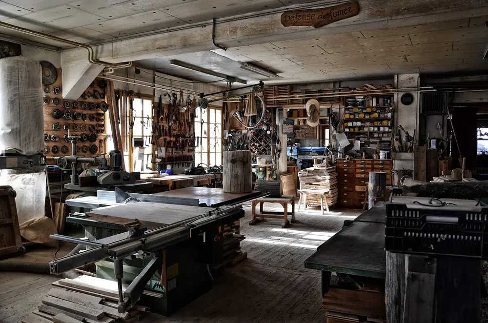 Woodworking workshop with saws and hand tools where a cordless reciprocating saw earns its keep for rough cuts and demolition Woodworking workshop with saws and hand tools where a cordless reciprocating saw earns its keep for rough cuts and demolition