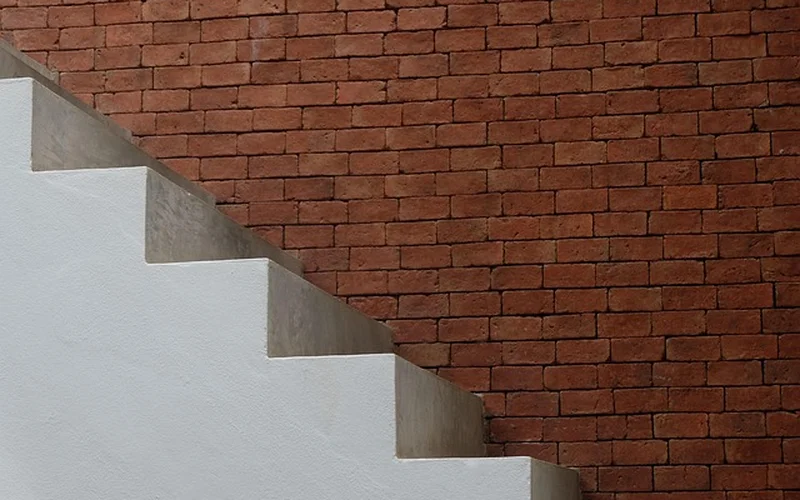 Painted white stair risers, the kind of vertical decorative face where MDF works well