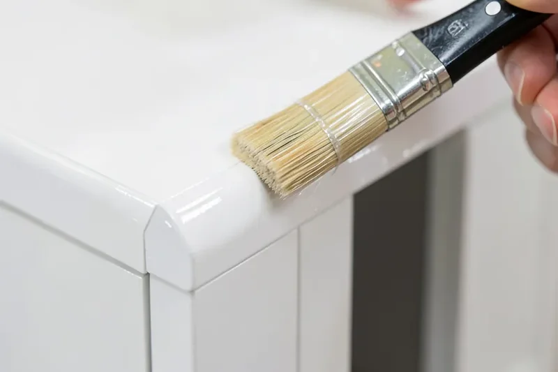 Applying a clear polyurethane topcoat to a painted MDF cabinet edge