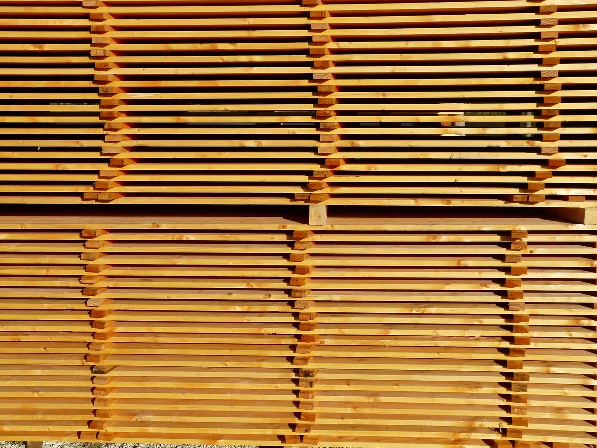 Close-up of stacked MDF boards showing sheet thickness