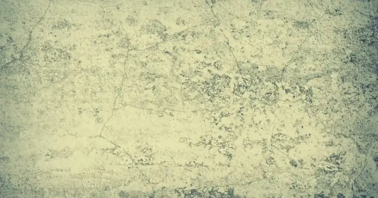 Bare gray concrete wall texture showing a solid, unpainted surface